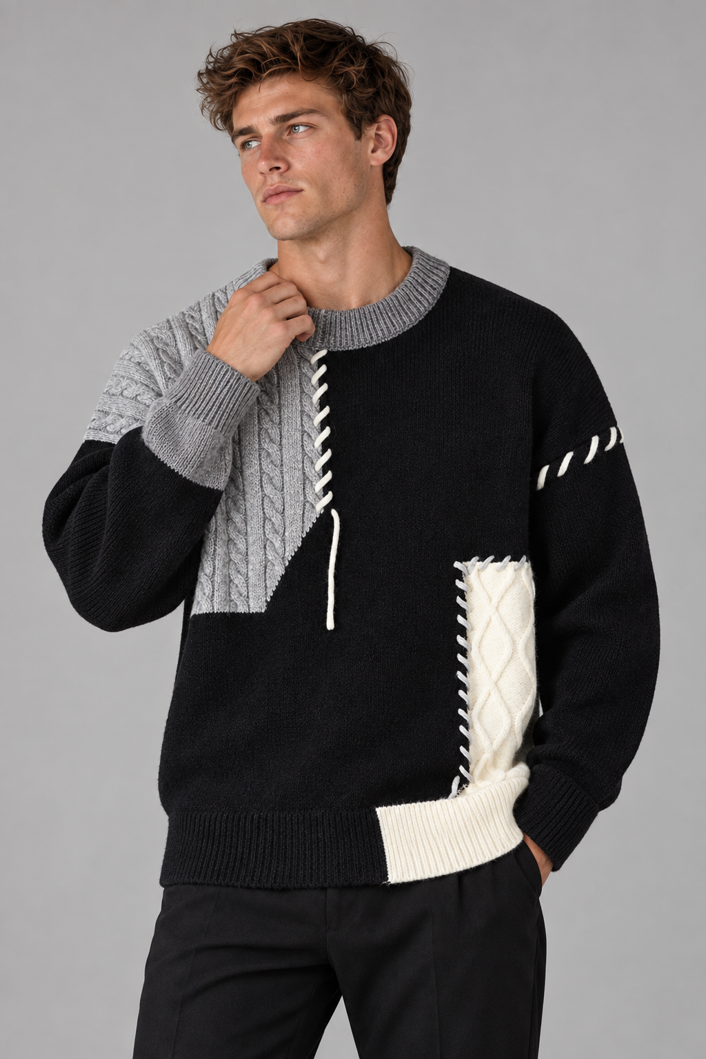 Color: Black | Oversize Strickpullover mit Patchwork- und Zopfmuster – Ansicht 1